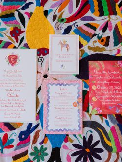 colorful wedding stationery on a colorful background